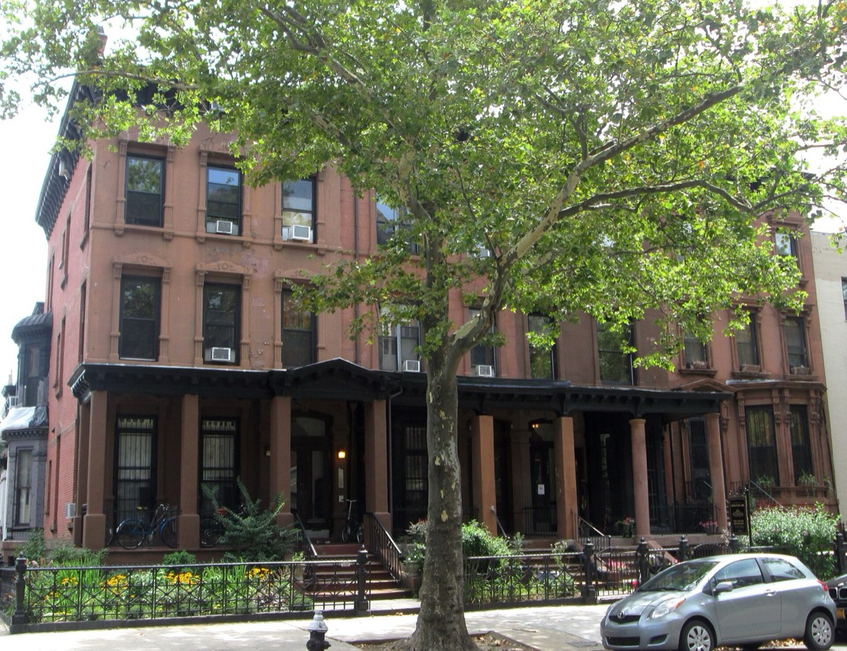 Brick and brownstone houses on Clinton Avenue