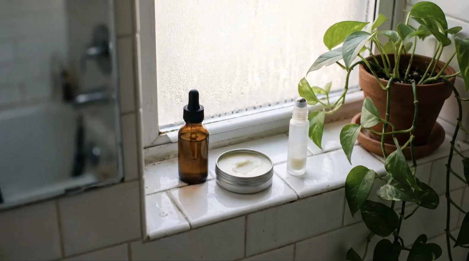 A tincture bottle on a windowsill